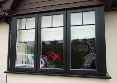 Wood effect uPVC window in black