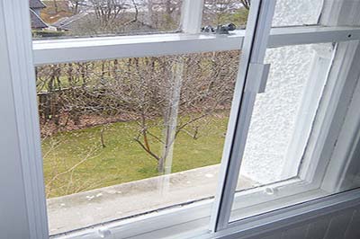 Install horizontal sliding secondary glazing